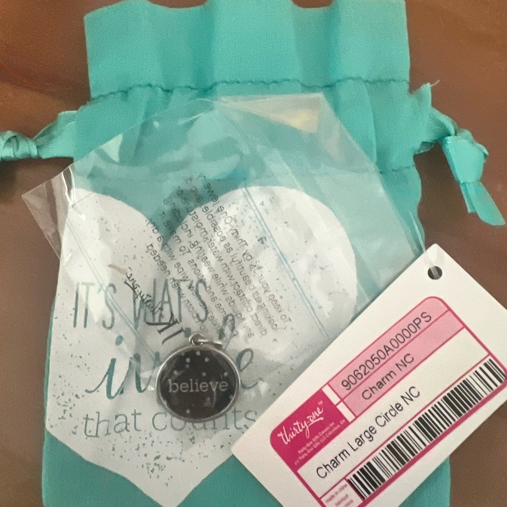 Thirty-One Silver Believe Charm with Teal Pouch
